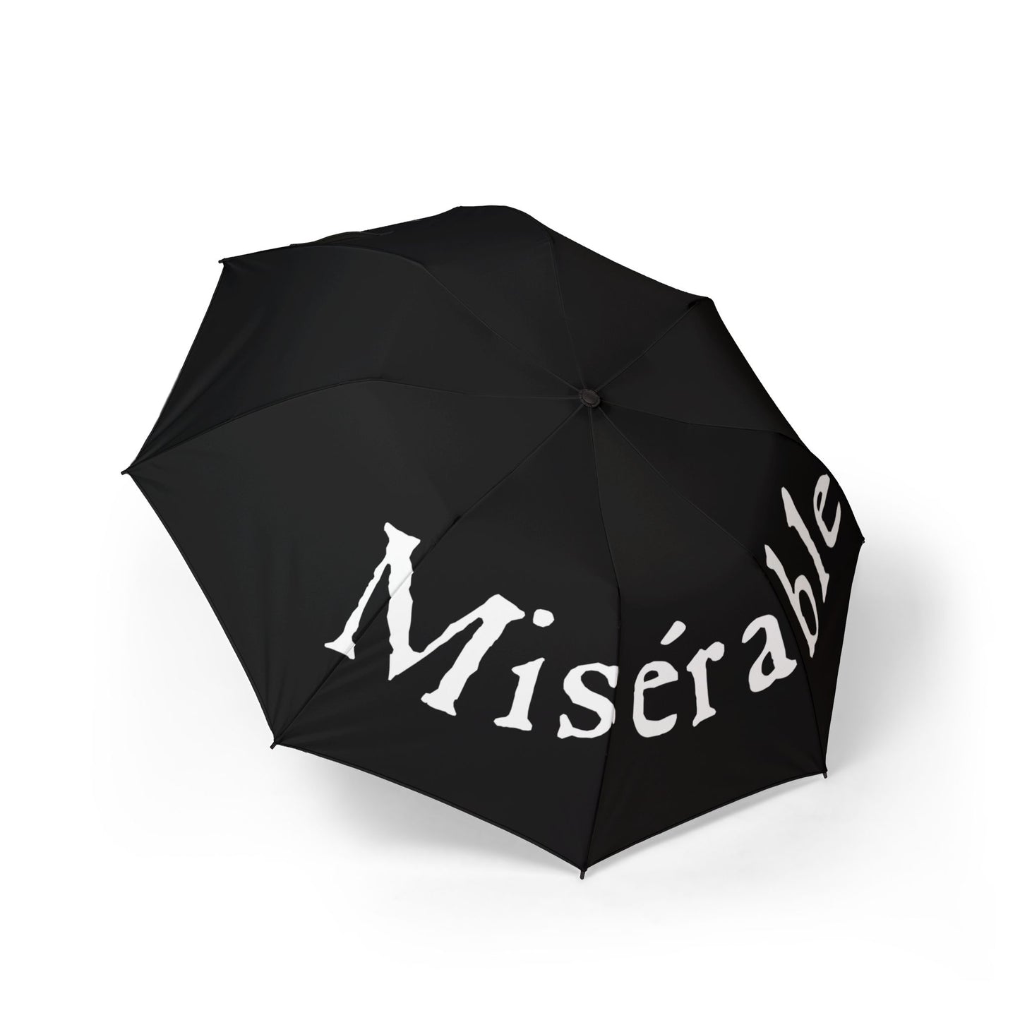 Dramatic French Statement Umbrella 'Misérable.'